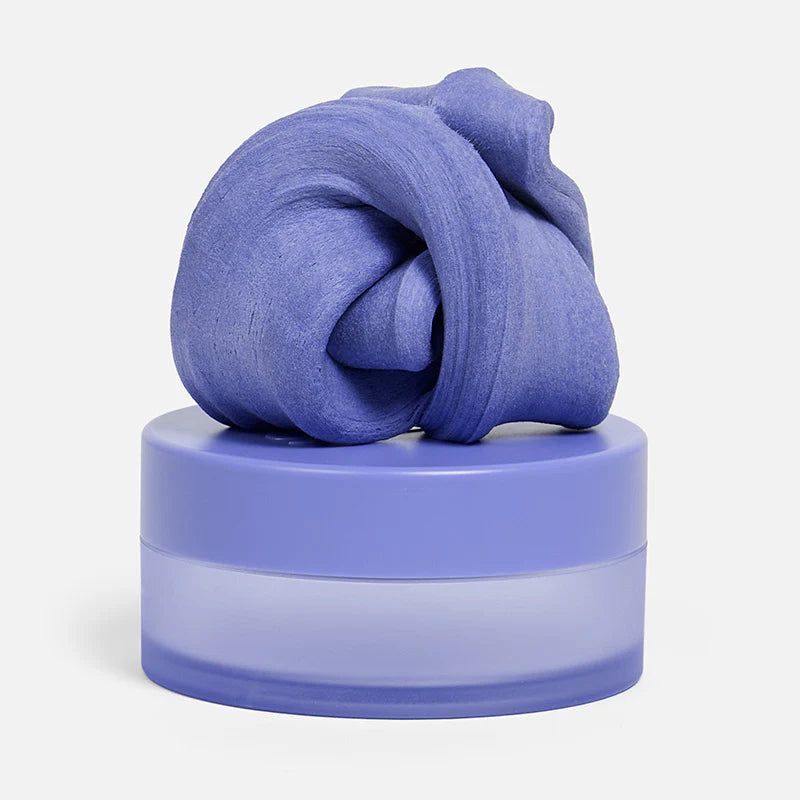 purple fidget putty set on a its container shown on a white background