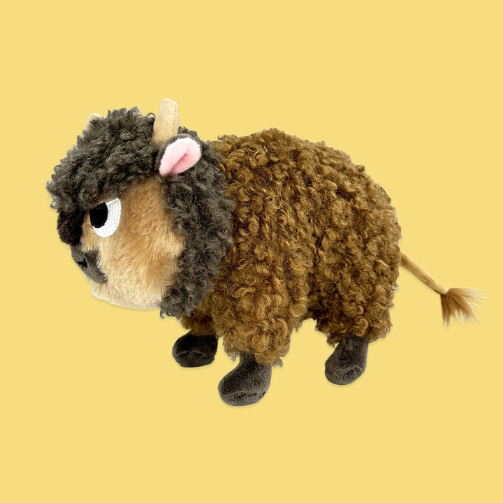 Buffalo Fluffalo Plush Toy side facing view on a yellow background