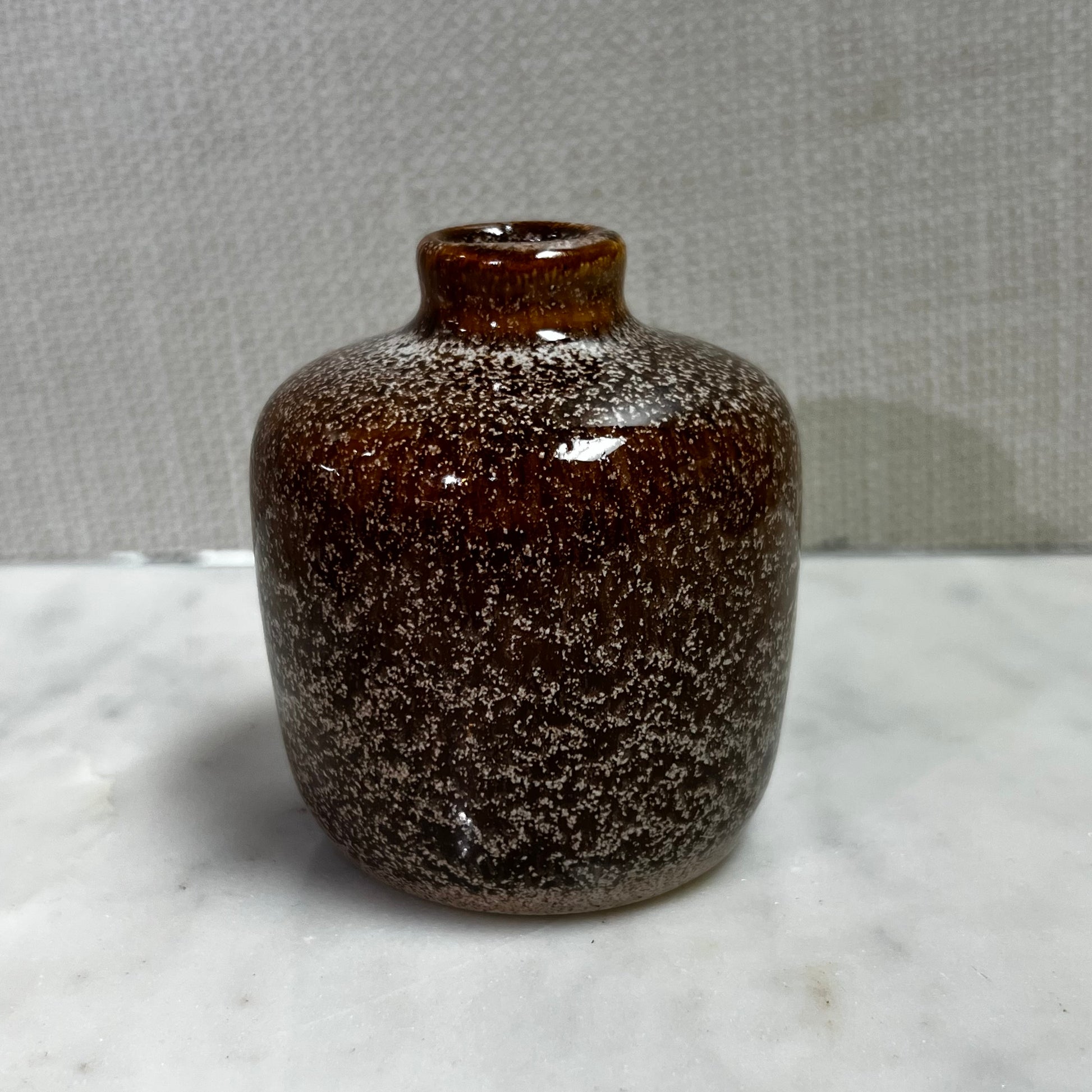 short brown vase.