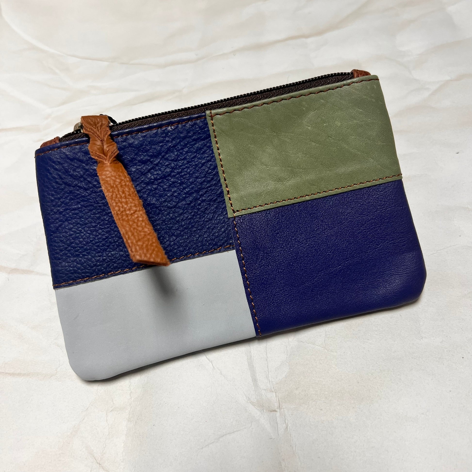 zahra pouch with blue and green patchwork.