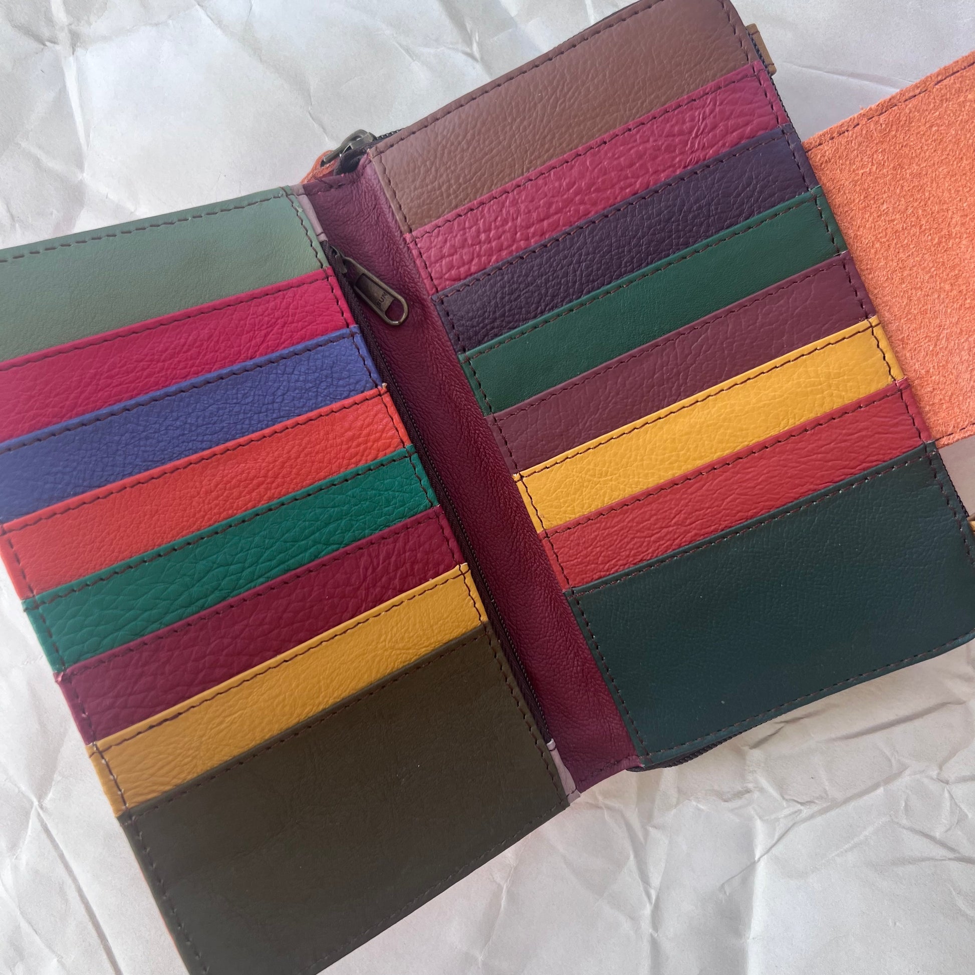 view under orange Beatrice Clutch magnetic flap showing colorful card slots