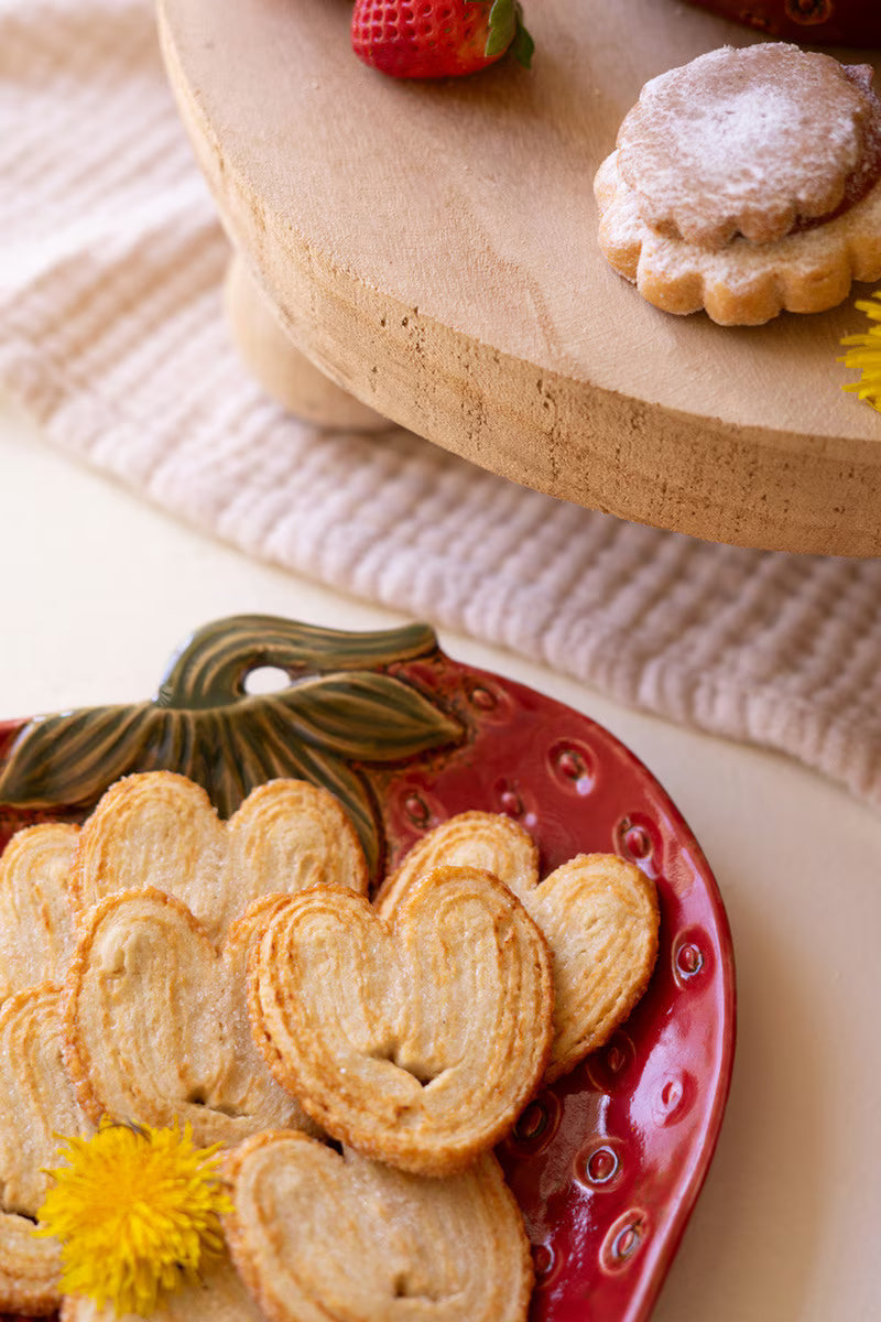 close-up of Ceramic Strawberry Platter filled with cookies