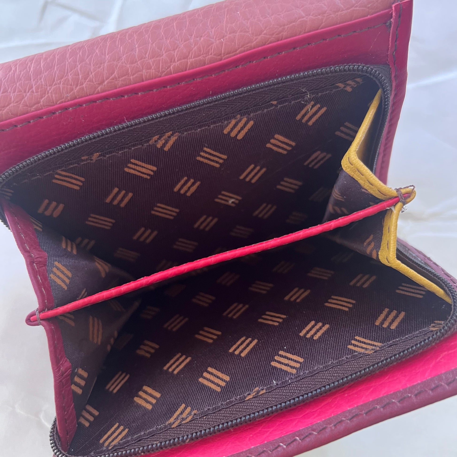 interior view of sunset rings wallet zipper pocket