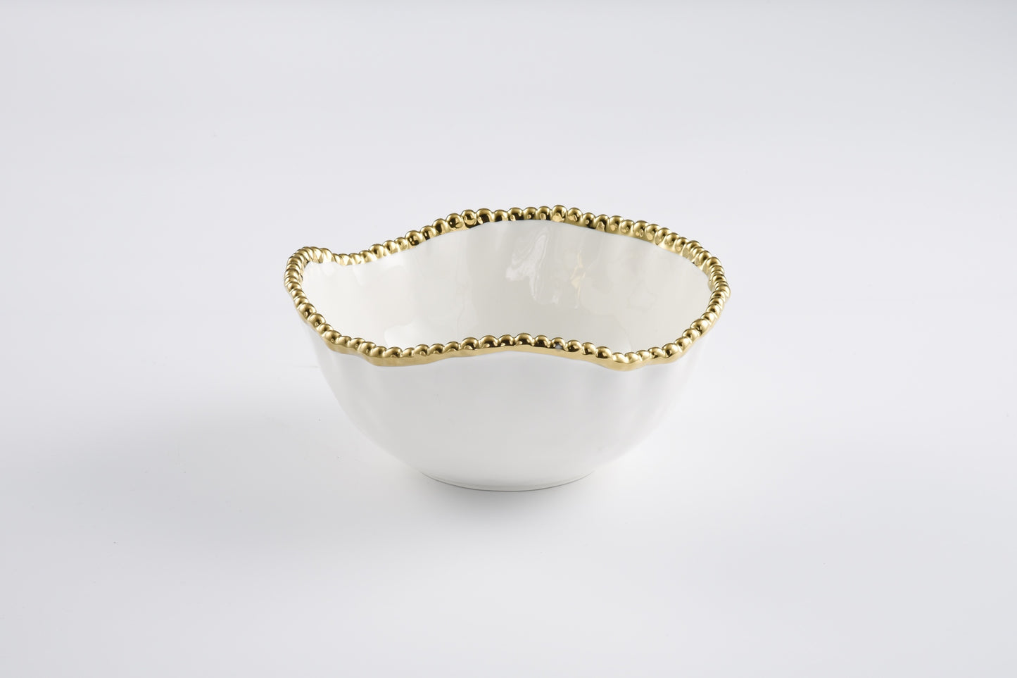 Golden Salerno Oversized white Serving Bowl with golden beaded rim shown on a white background
