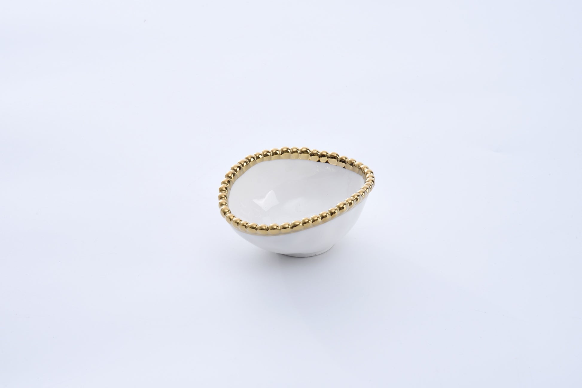 small white Oval Condiment Bowl with gold beaded rim on a white background
