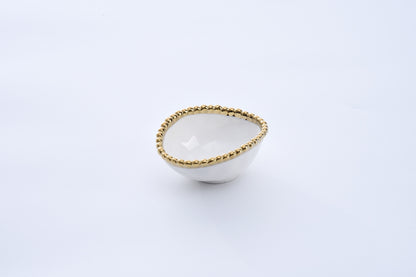 small white Oval Condiment Bowl with gold beaded rim on a white background
