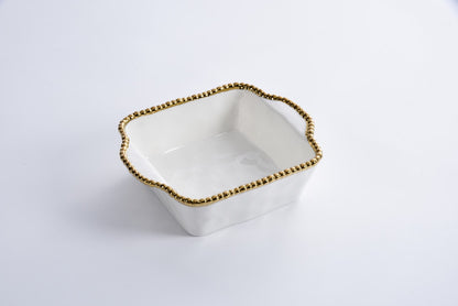 white Baking Dish with gold beaded rim shown on a white background
