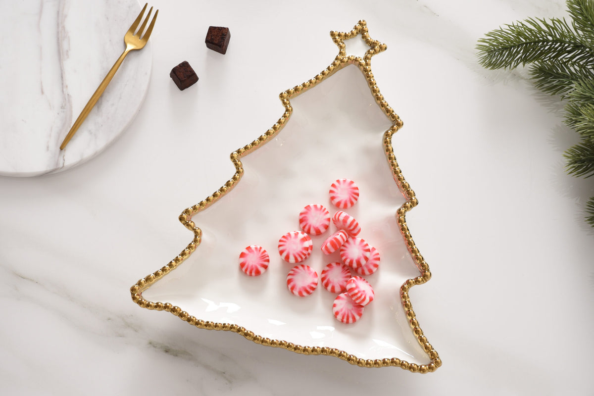 christmas tree shaped platter with candy in it
