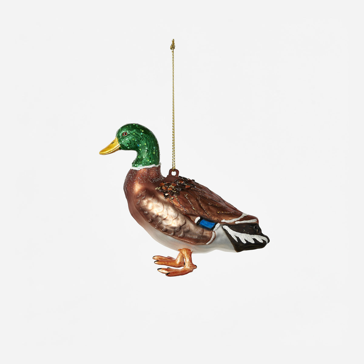 glass and glitter mallard duck ornament on a white background