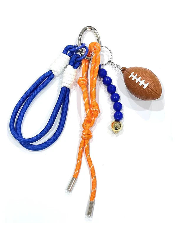blue football bag charm shown on a white background