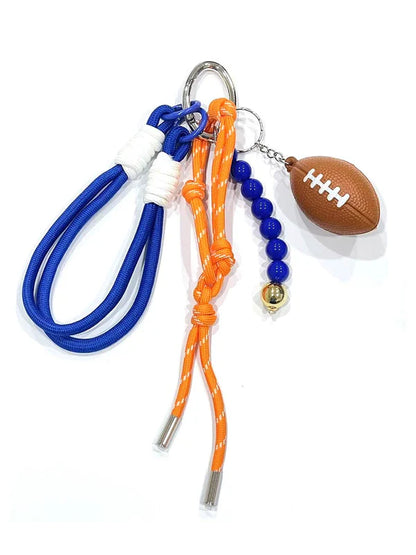 blue football bag charm shown on a white background