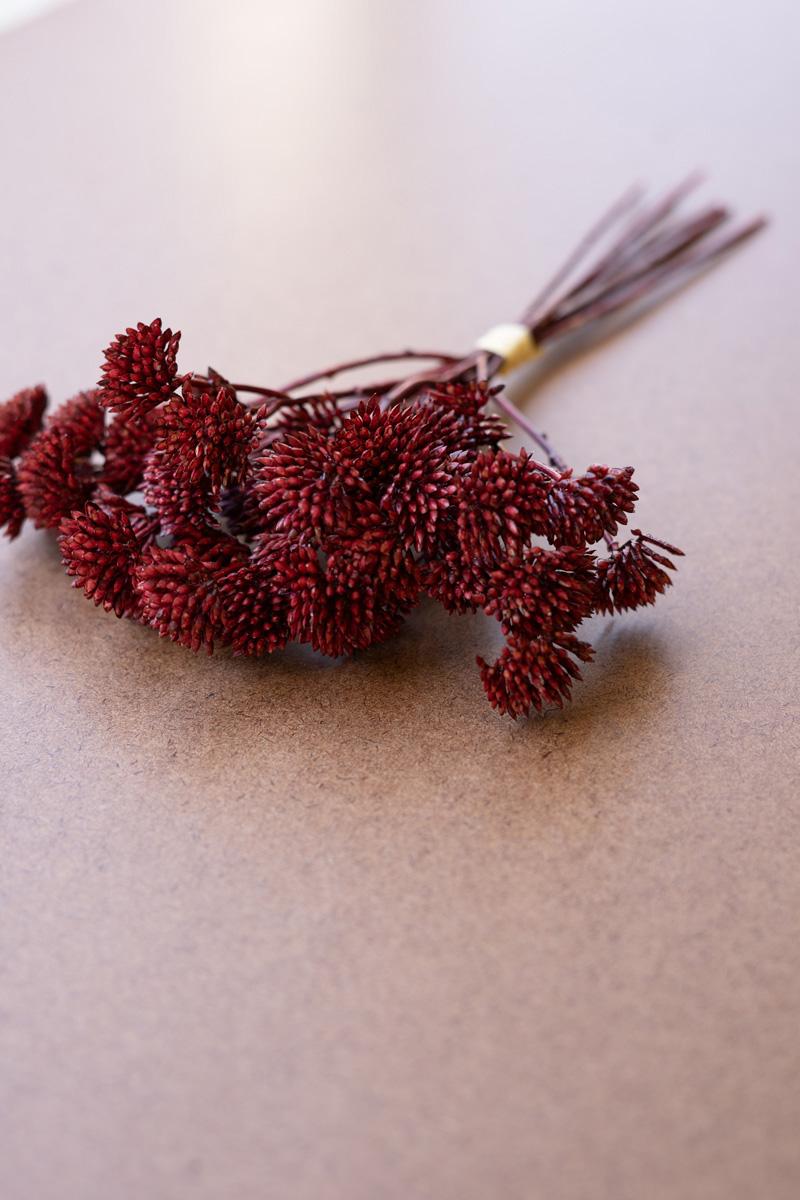 close-up of burgundy flower bundle.