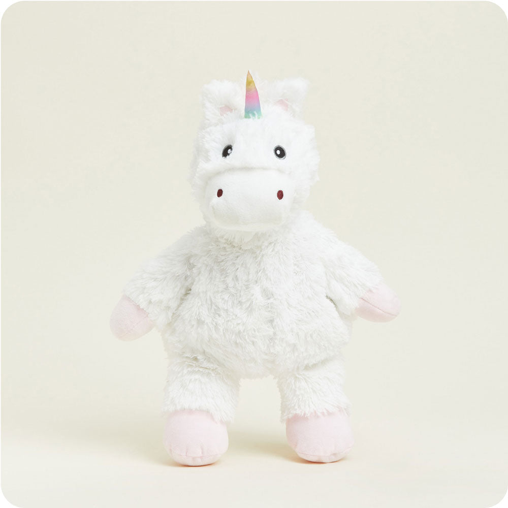standing view of white unicorn plush toy