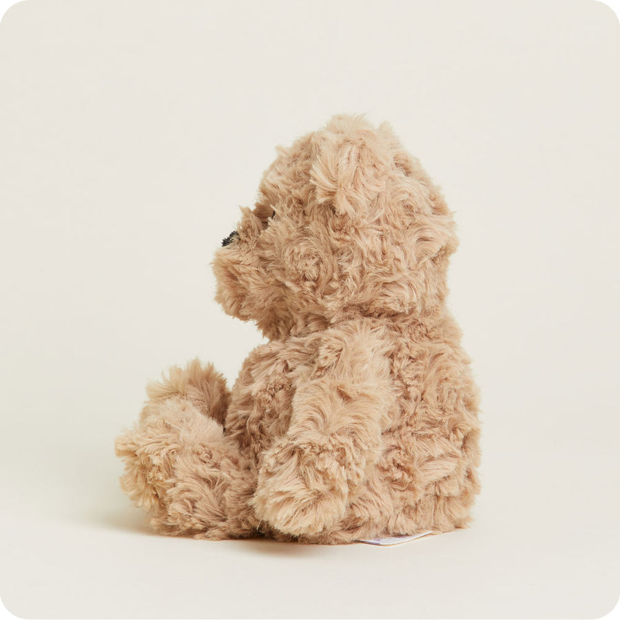 side view of Brown Curly Bear Junior Plush Toy.