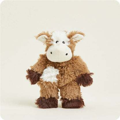 standing view of cow junior plush toy