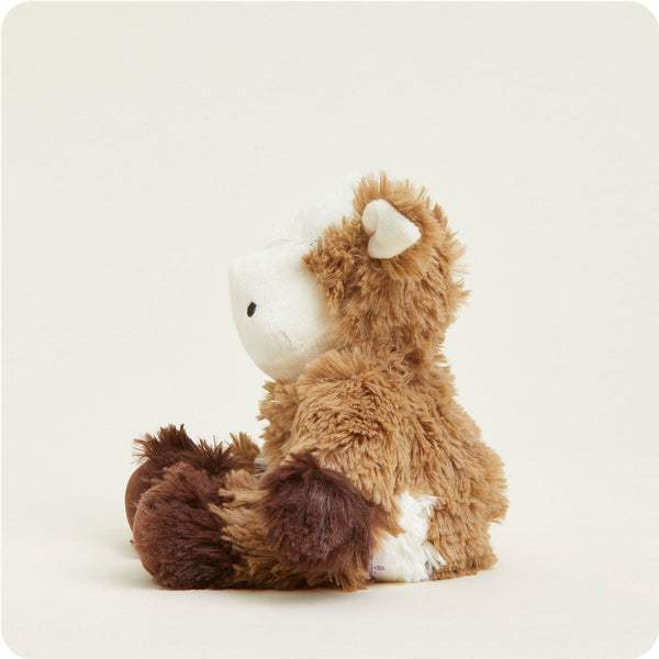 side view of cow junior plush toy