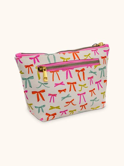 side view of put a bow on it zipper bag.