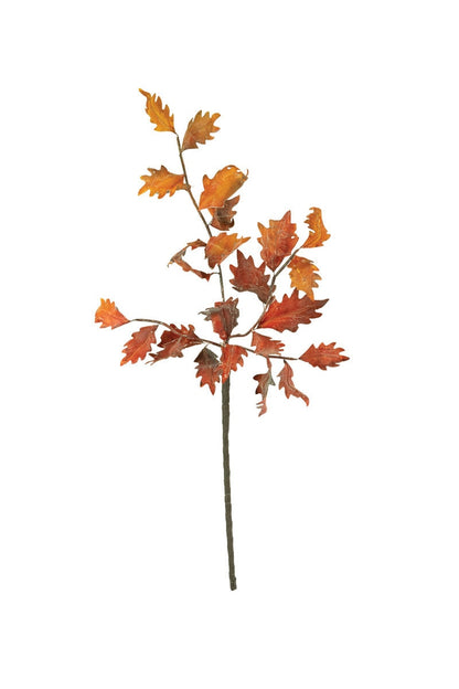 Artificial leaf branch with orange and red leaves on a white background