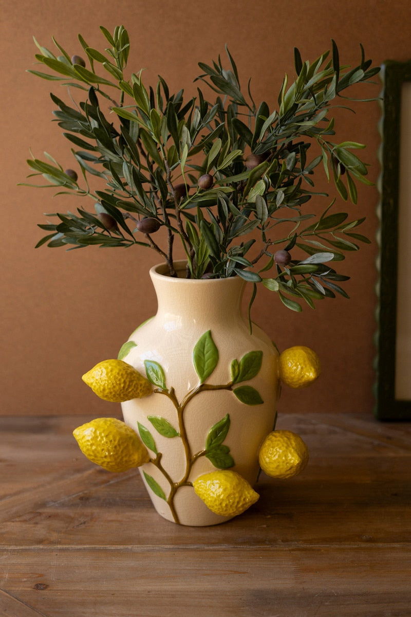 large off-white vase with dimensional lemon design filled with olive ranches