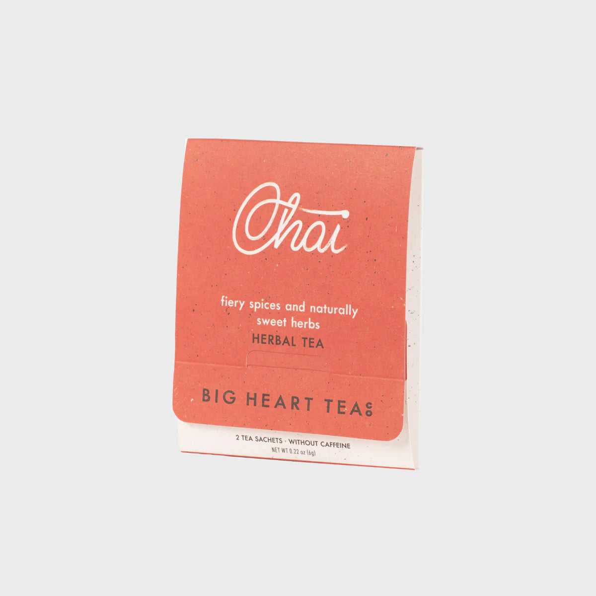 Chai Tea Bags in pinkish orange packaging shown on a white background