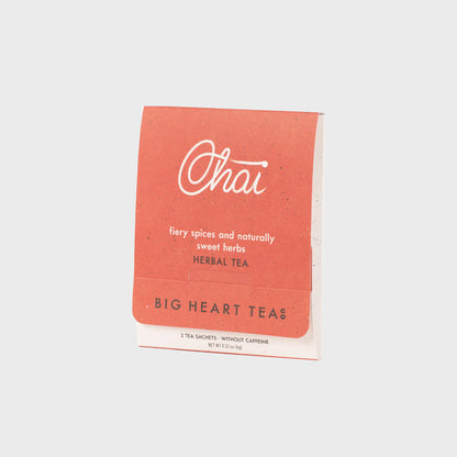 Chai Tea Bags in pinkish orange packaging shown on a white background