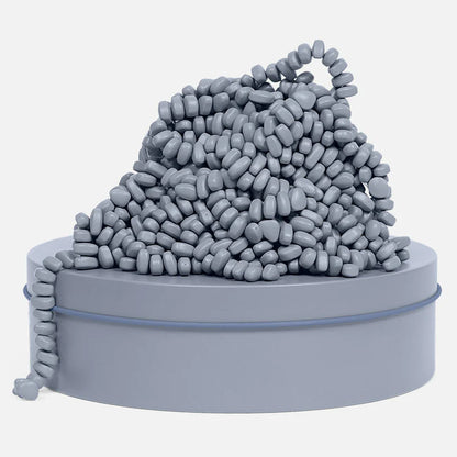 Slate crags piled on top of the slate colored tin on a white background