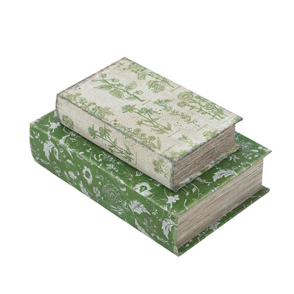 Two decorative boxes with floral patterns stacked on a white background
