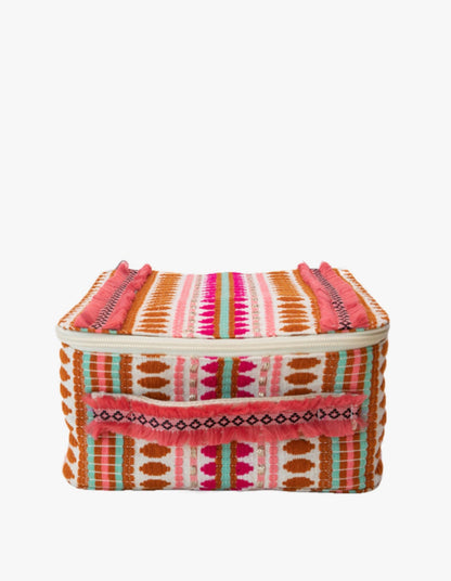 square travel case with multi-colored pattern.