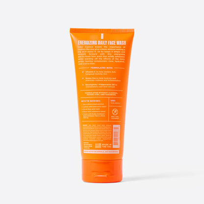 back view of orange tube of energizing face wash.