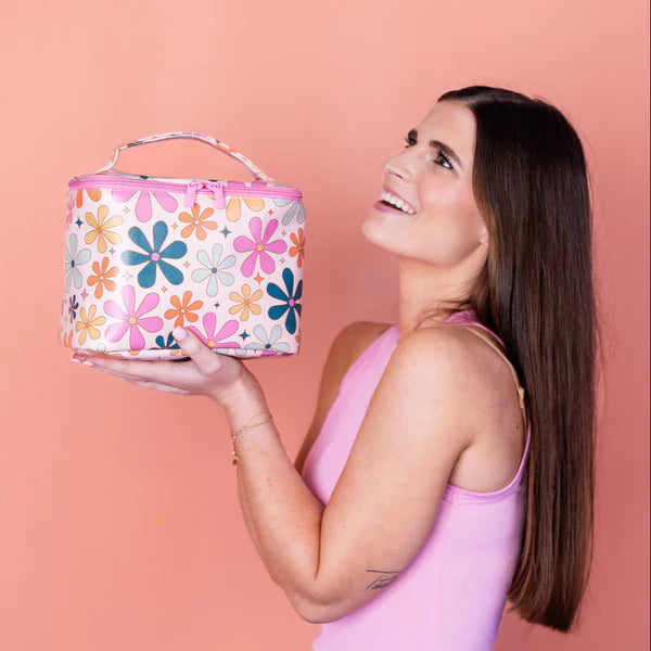 smiling person holding Betty Bloom Soulmate Bag