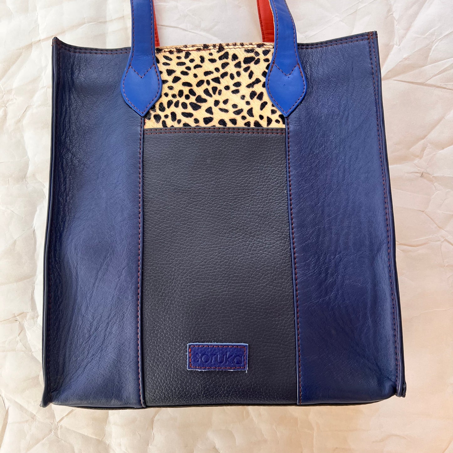 front view of peacock  Giselle tote.