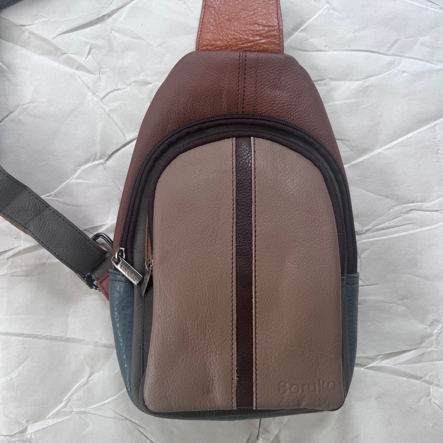 front view of driftwood Gregg Sling Bag