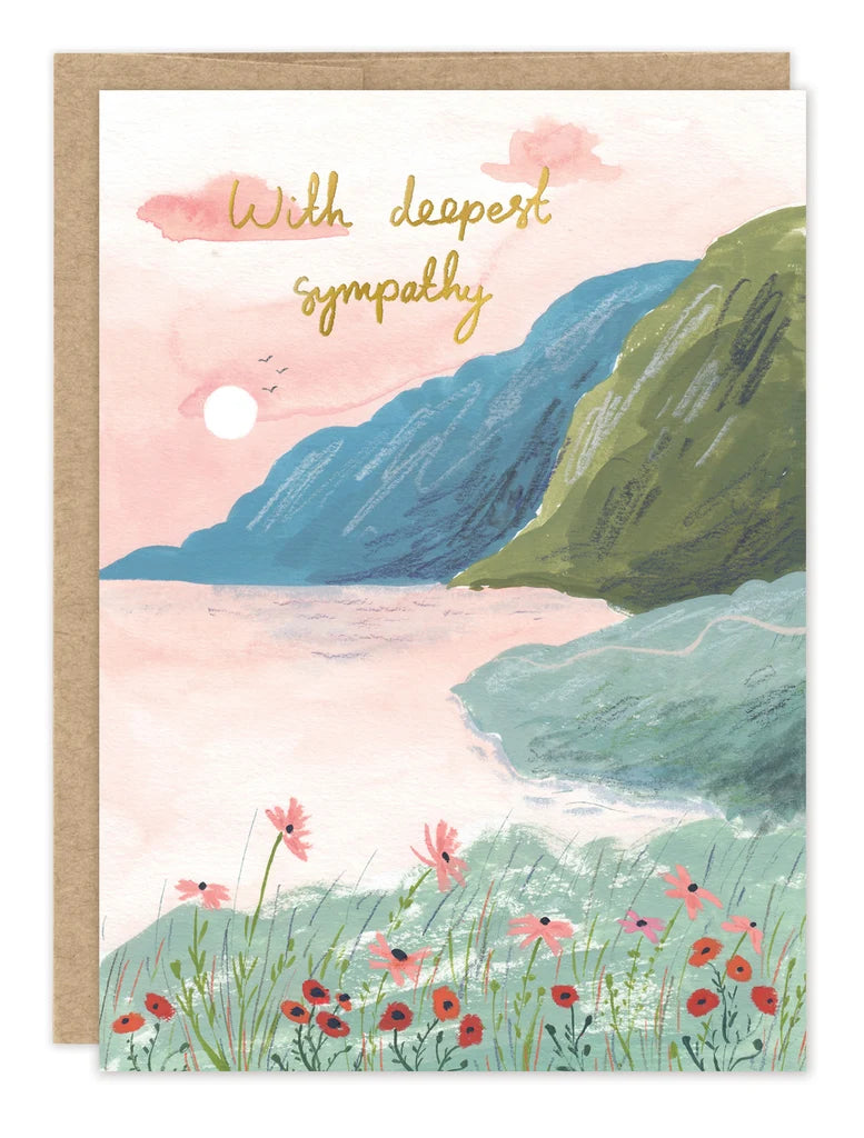 front of card featuring mountains and a lake