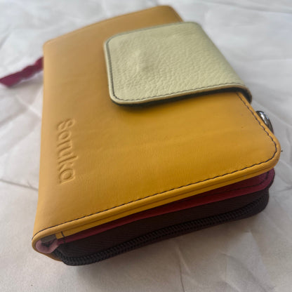 side view of yellow Beatrice Clutch