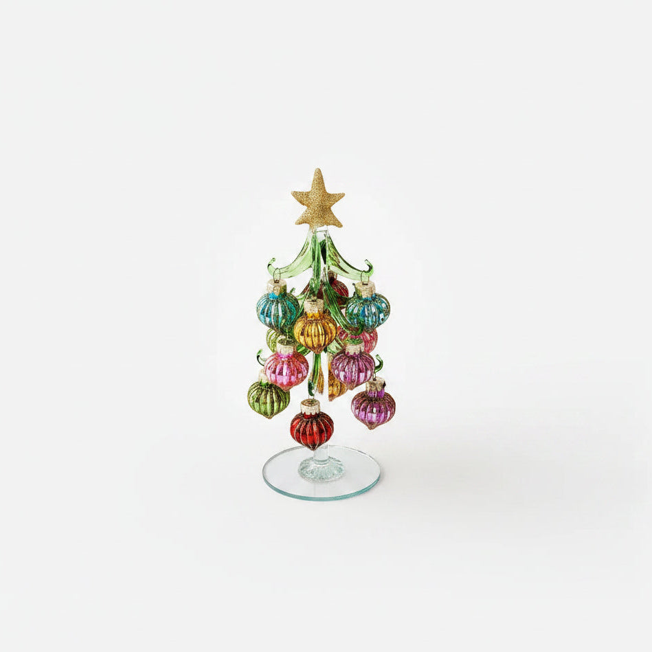 glass Christmas tree with colorful teardrop shape ornaments with striped glitter pattern on them and gold star topper on it