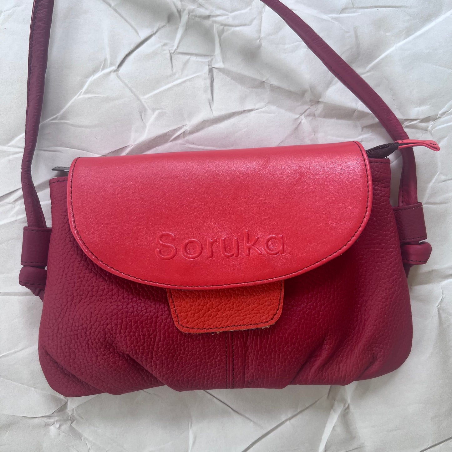 berry Gianna Crossbody Purse with red tab