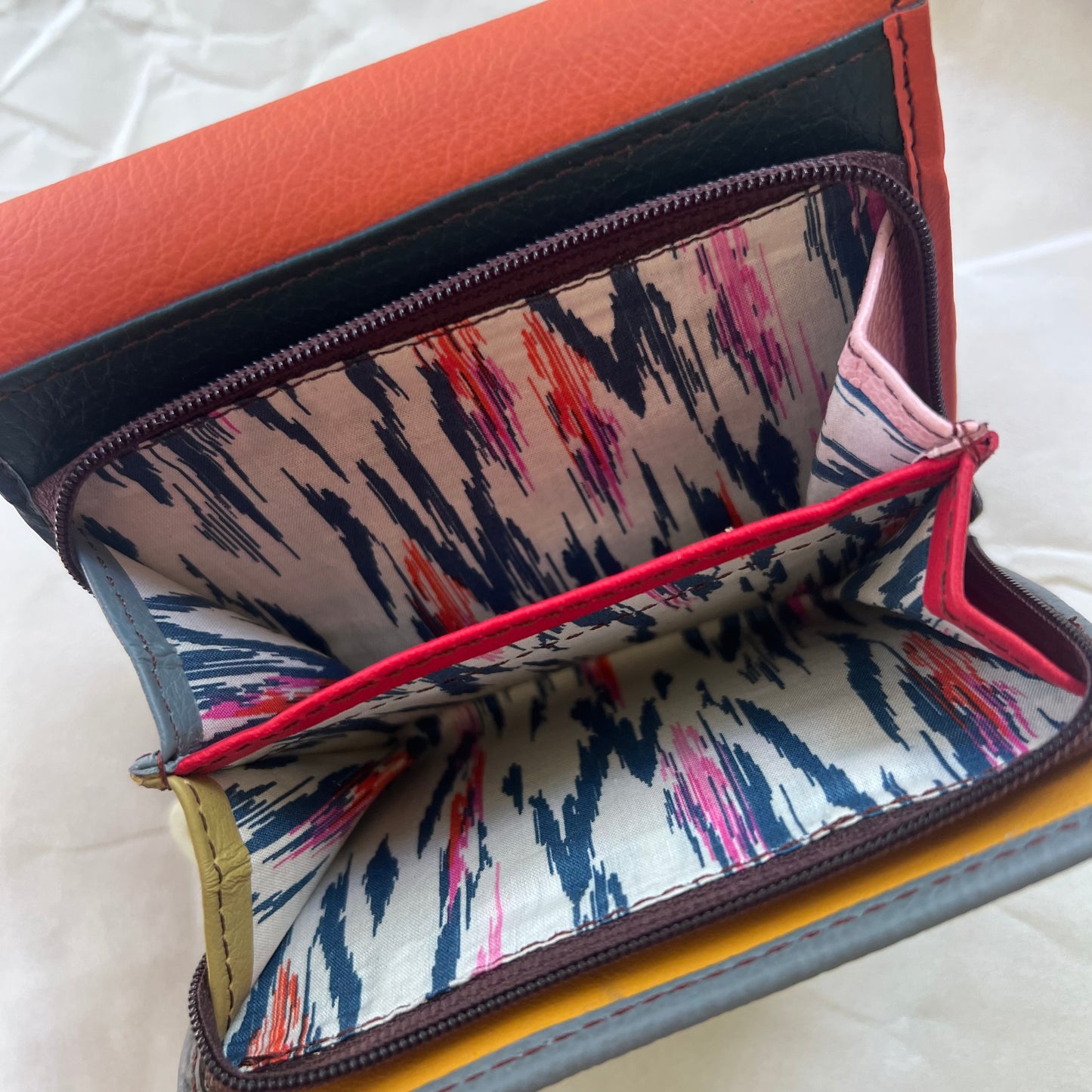 interior view of seafoam rings wallet zipper pocket