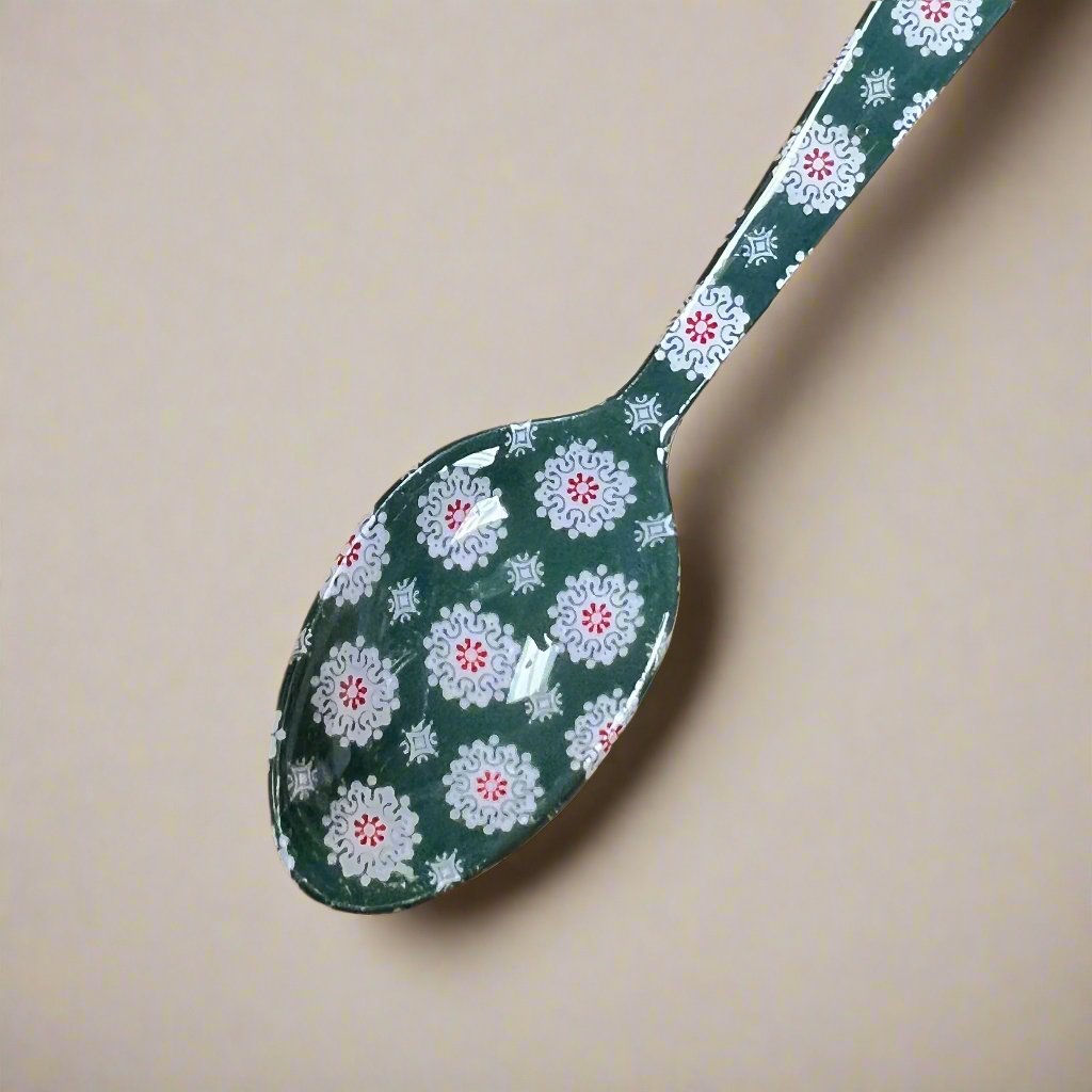 green spoon with snowflake design.