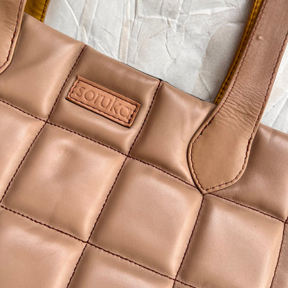 close-up of front view of taupe Mykonos Tote.