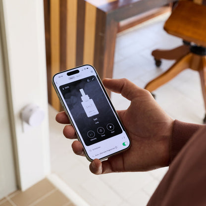a person using the pura app on a smart phone