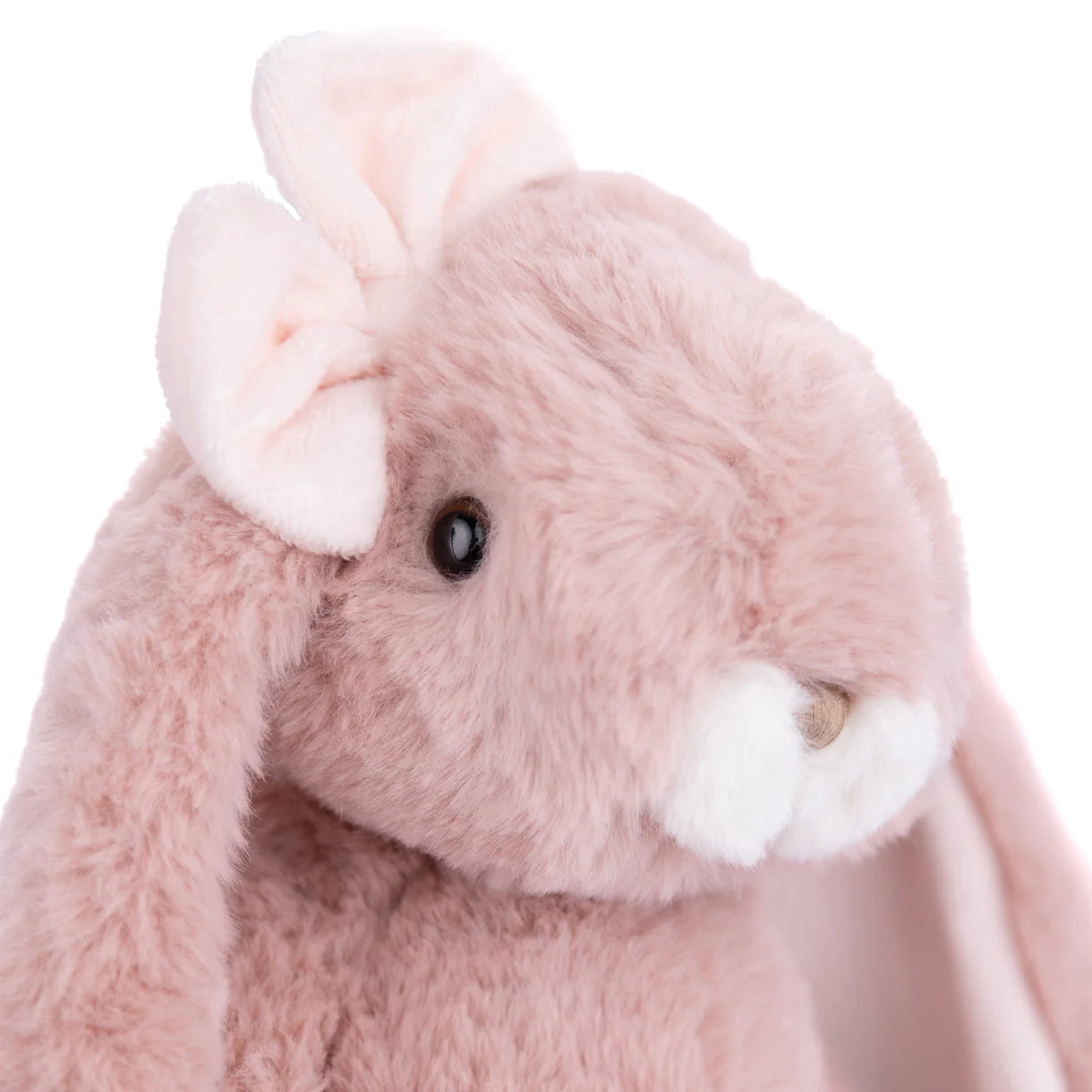 close-up of pink plush bunny's face