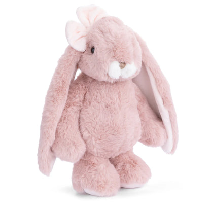 pink plush bunny with bow on one ear shown on a white background