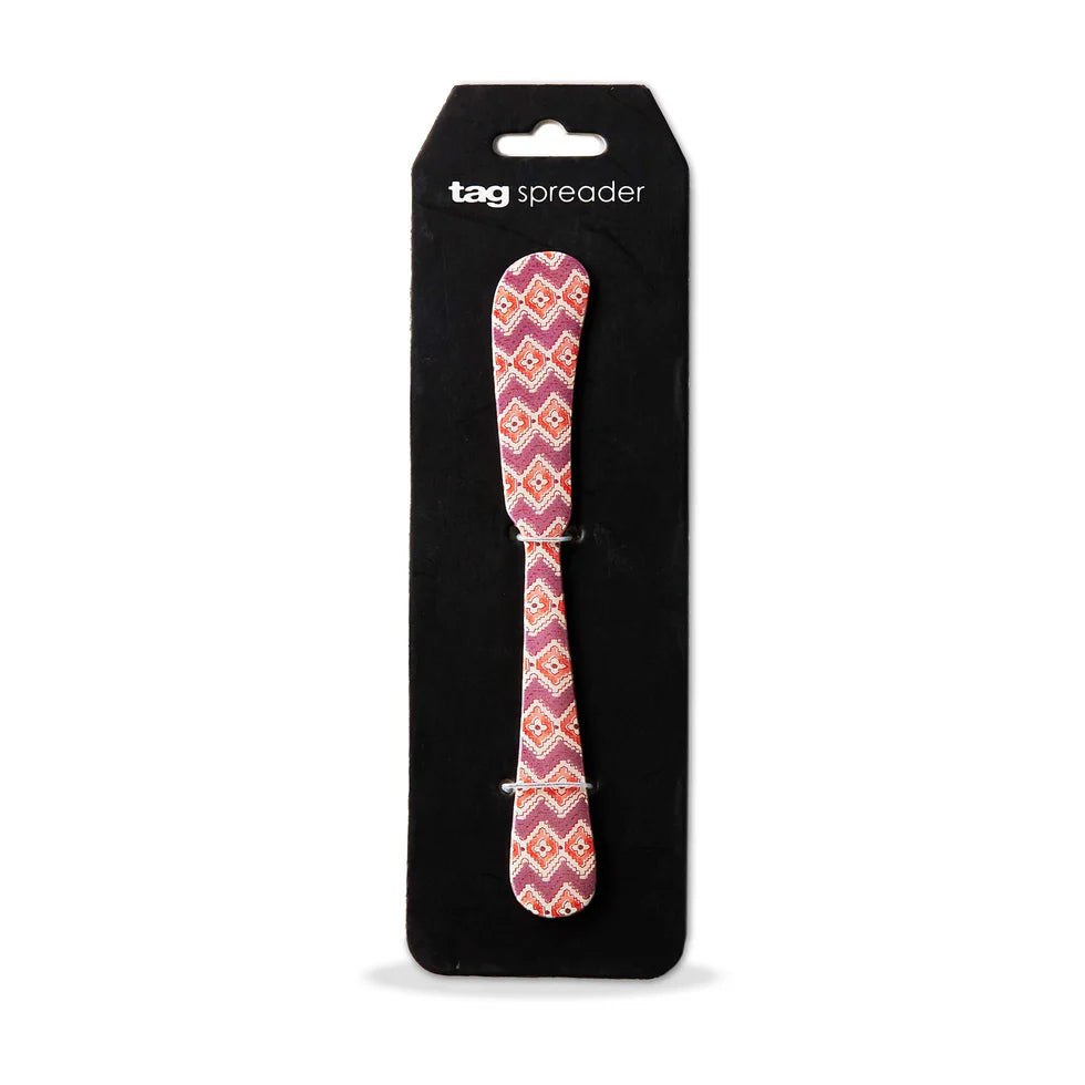 Jasmine Enamel Spreader tied to its card packaging