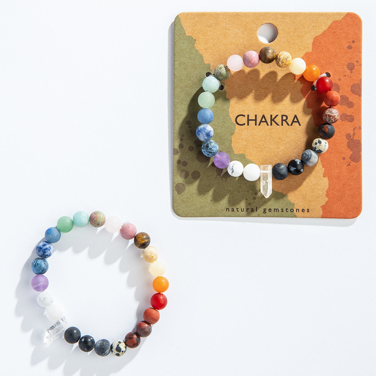 beads bracelets with crystal, one on and one off the card packaging.