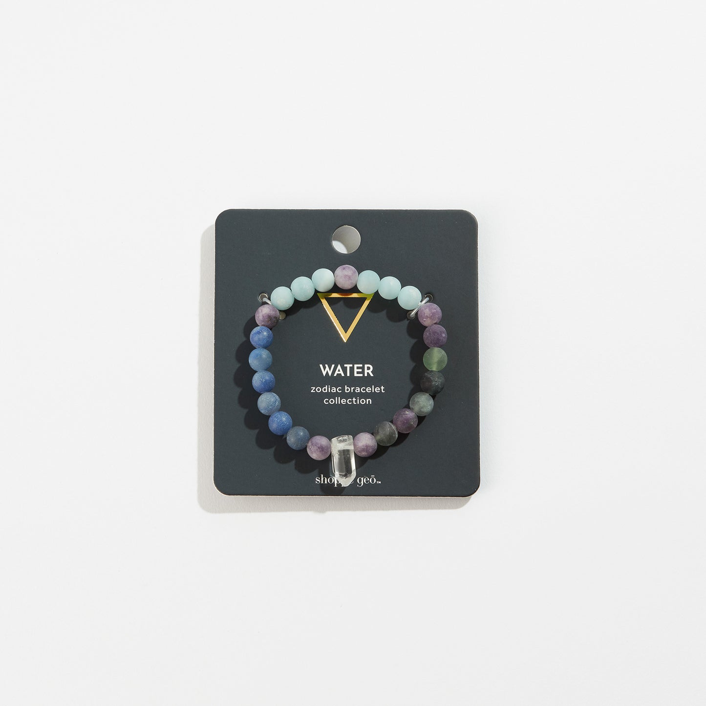 stone bead bracelet with crystal on its card packaging.