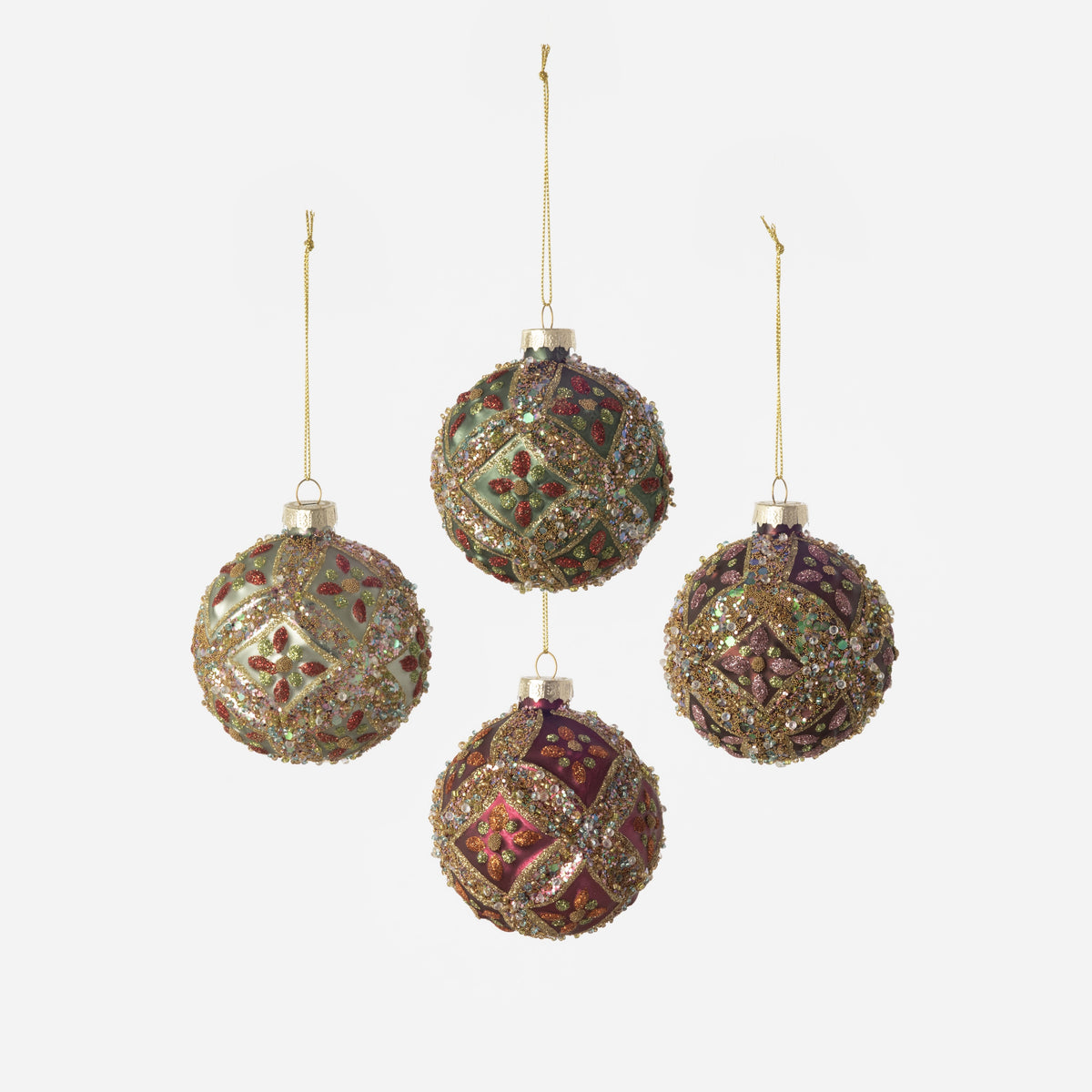 4 bejewelled ornaments on a white background