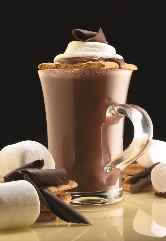glass mug filled with S'Mores Double Truffle Hot Chocolate and topped with chocolate and marshmallows set on a table with chocolate shavings and marshmallows.