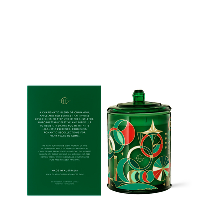 Under the mistletoe candle set next to the back view of its box packaging.