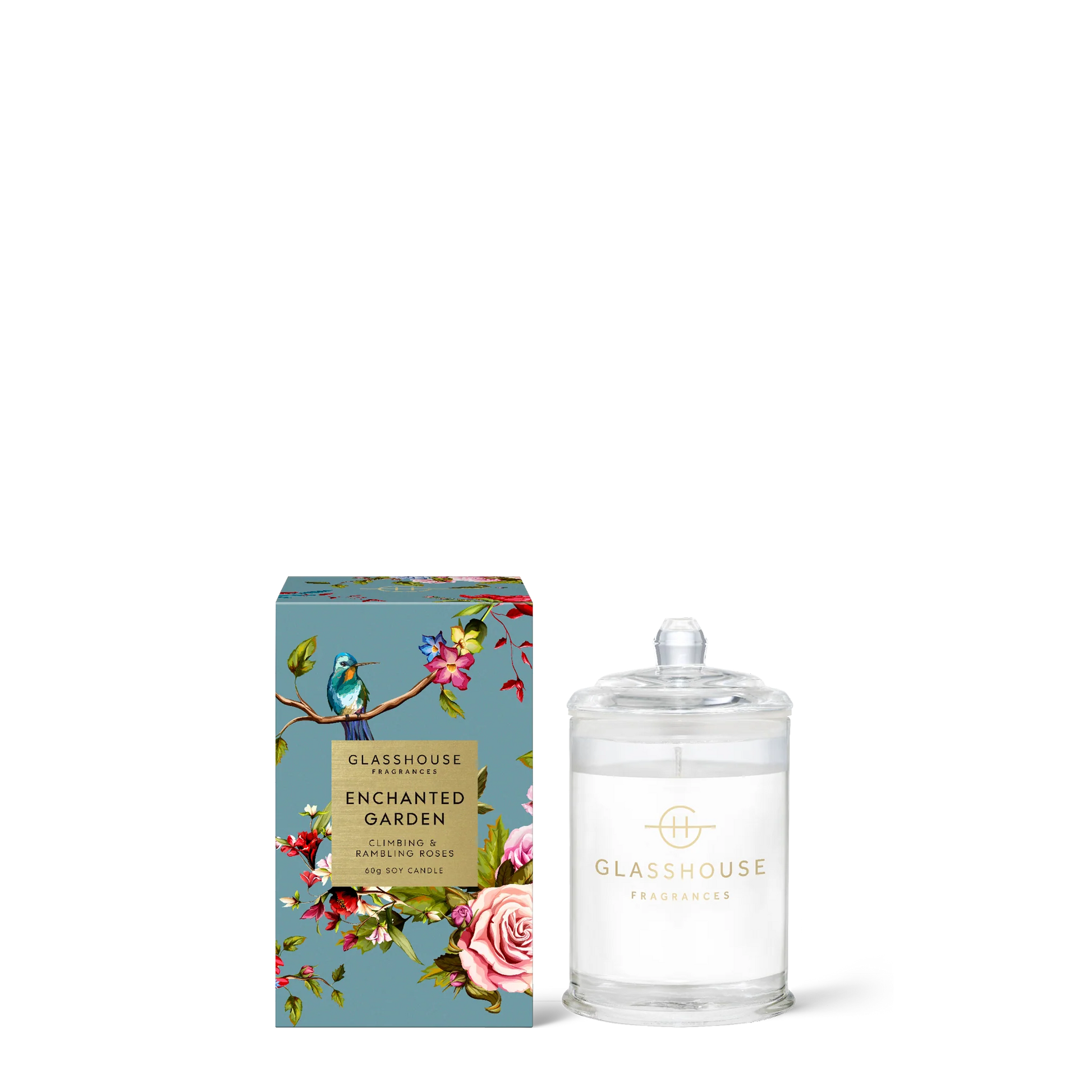 Glasshouse Fragrances Enchanted Garden Small Candle set next to its box packaging.