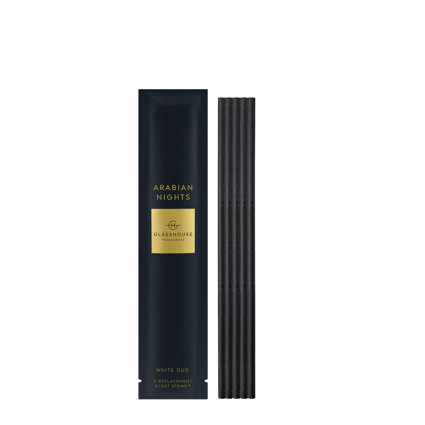 Arabian Nights scent stems set next to its black and gold packaging
